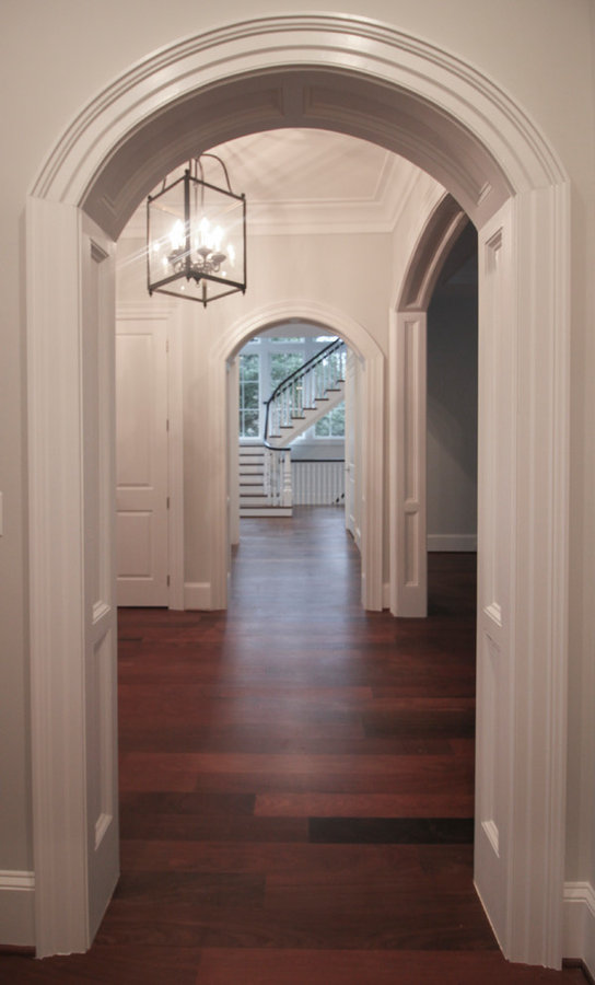 Powerful Impression by Floating Staircase in Suburban Foyer