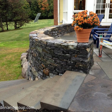 tall Stone retaining Walls and slab steps