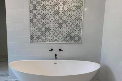 Inspiration for a contemporary master gray tile and subway tile marble floor and white floor freestanding bathtub remodel in Phoenix