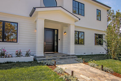 Transitional exterior home idea in Los Angeles