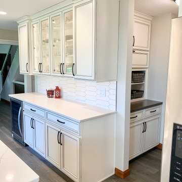 Kitchen Remodel with Ivory Cabinets , Drop Zone, and Hutch Area