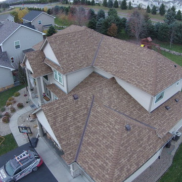"Desert Tan" Owens Corning Duration Roof by Storm Group Roofing.
