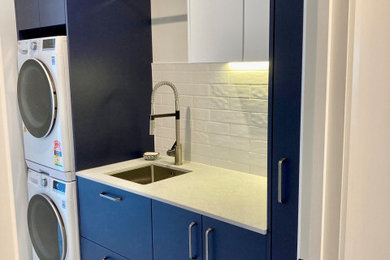Example of a trendy laundry room design in Christchurch