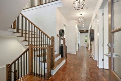 Example of a farmhouse staircase design in Atlanta