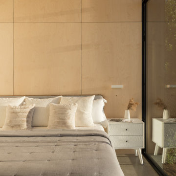 Bedroom with birch plywood accent wall - Fold House Berkeley Hills