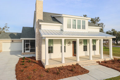Example of a beach style exterior home design in Other