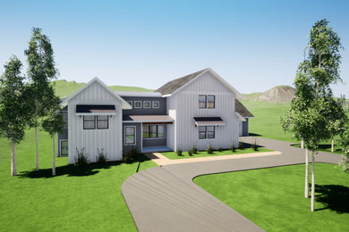 Inspiration for a mid-sized cottage white two-story metal exterior home remodel in Other with a mixed material roof