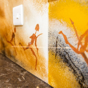 "THE CAVEMAN" bespoke kitchen splashback by designer Juliet Eve