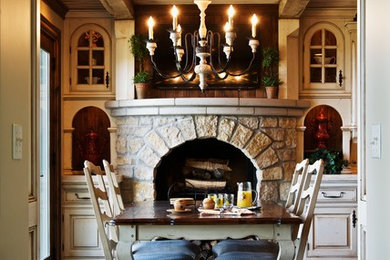 Kitchen/dining room combo - rustic kitchen/dining room combo idea in Chicago