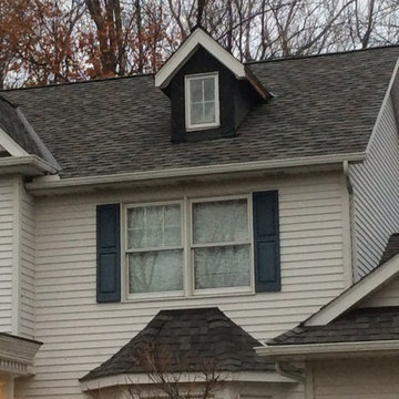 Landmark TL HD colonial slate. Siding removed from dormers and chimney chase. Th
