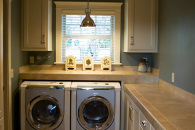 Inspiration for a country laundry room remodel in Other