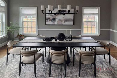 Large transitional medium tone wood floor and brown floor kitchen/dining room combo photo with gray walls