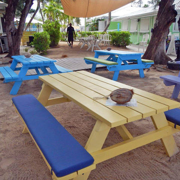 Sunbrella RAIN bench cushions add playful vibe to beach picnic tables