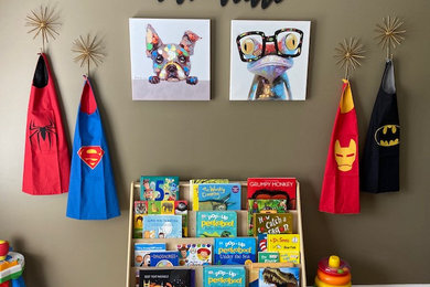 Inspiration for a light wood floor and brown floor toddler room remodel in Nashville with brown walls
