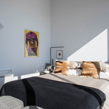 Suite with Black Bed and Colourful Artwork