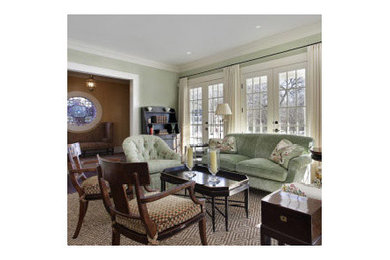 Example of a mid-sized formal and enclosed living room design in Kansas City with green walls