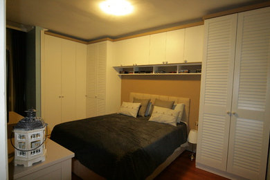 Bedroom - traditional bedroom idea in Other