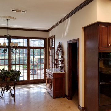 Old wallpaper removed from kitchen & dining, lighting updated