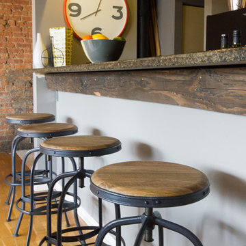 Industrial dining stools near kitchen breakfast bar