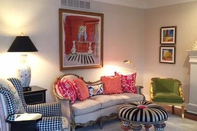 Example of a mid-sized eclectic open concept dark wood floor and brown floor living room design in Other with white walls, a standard fireplace and a wood fireplace surround