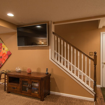 Finished basement with exercise area and small bath in Wexford, PA