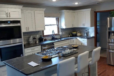 Example of a minimalist kitchen design in Other
