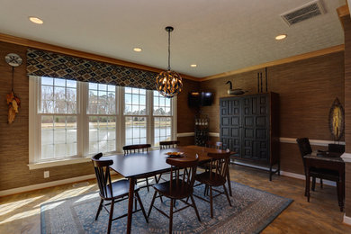 Example of a mid-sized transitional dining room design in Other