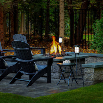 Make a Statement with a Versatile Outdoor Kitchen and Double Fire Feature