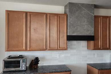Example of a minimalist kitchen design in Denver