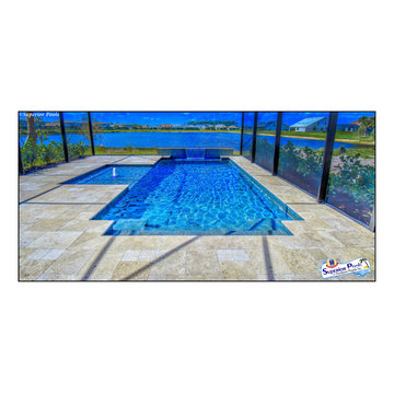 (Rennehan) FT MYERS FL Superior Pools Swimming Pool With Raised Wall & Waterfall