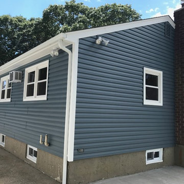 Massapequa Park Siding - Harbor Blue Shakes with Dutch Lap Sides & Windows