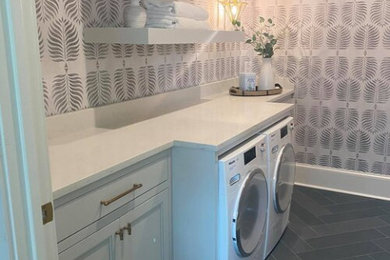 Example of a transitional laundry room design in Miami