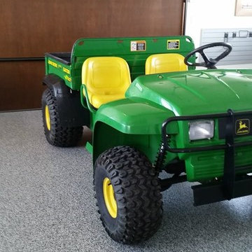 Floor is done and the John Deere is back where it belongs