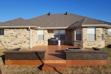 Fort Smith Concrete Pad with Retaining Wall Before & After