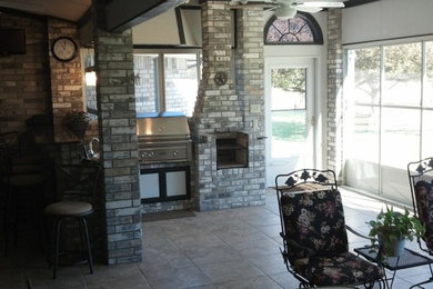 Example of a mid-sized backyard patio design in Austin
