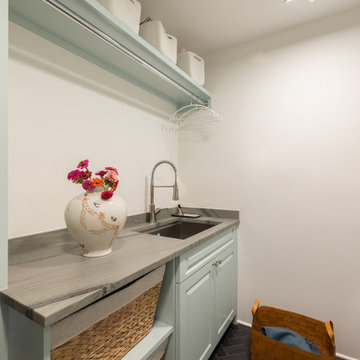 Laundry Room with Celadon Cabinets and Sorting Baskets