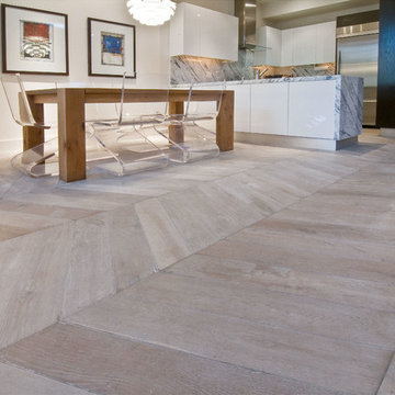 Dining Area Features Chevron Hardwood Flooring