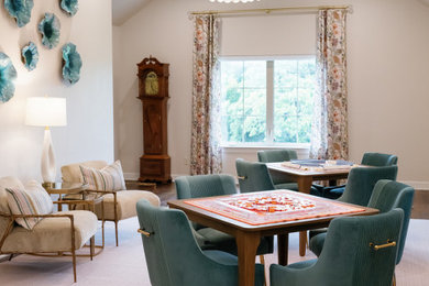 Inspiration for an eclectic open concept medium tone wood floor game room remodel in Dallas with beige walls