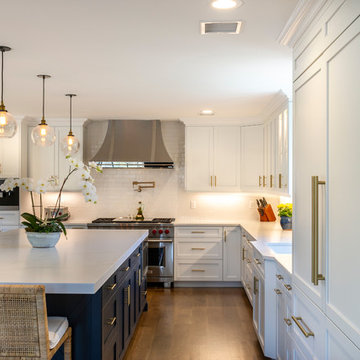 White Modern Kitchen with Compac Quartz Counters and Island