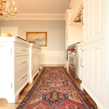 Arched Valance Toe Kicks on White Inset Cabinets