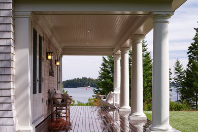 Elegant two-story wood exterior home photo in Portland Maine