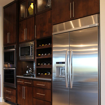 Slab veneer cabinet doors in select walnut by TaylorCraft Cabinet Door Company