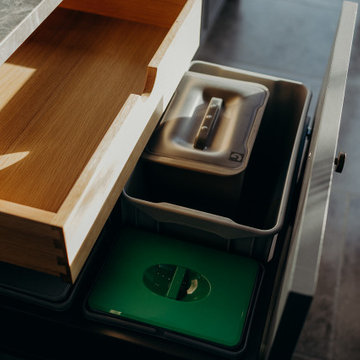 Pampas - Surrey showroom.  Bin drawers. Traditional kitchen details.