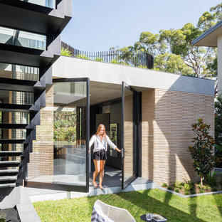 Design ideas for a mid-sized modern side yard formal garden in Sydney with a garden path.