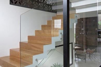 Inspiration for a contemporary staircase remodel in Other