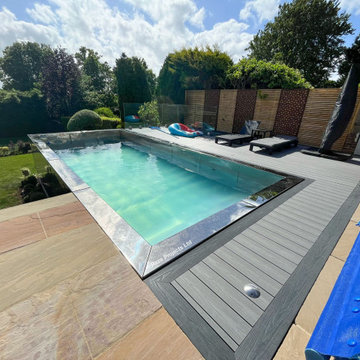 Family home garden makeover including stainless steel pool, studio and decking.
