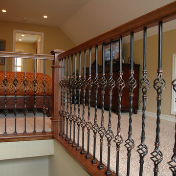 Wrought Iron Railing Adds Flair to Second Floor Bedroom