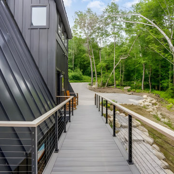 Embracing Inspiration: The Perfect Pairing of Cable Railings and Wooden Handrail