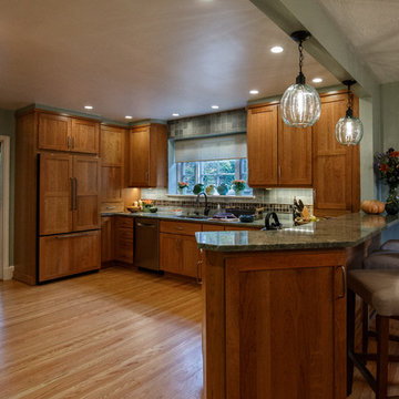 Warm Wood Kitchen Remodel | Natural Cherry Cabinetry, Granite Surfaces