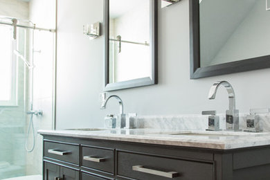 Example of a small transitional master white tile and porcelain tile porcelain tile and gray floor bathroom design in Toronto with shaker cabinets, brown cabinets, blue walls, marble countertops and white countertops